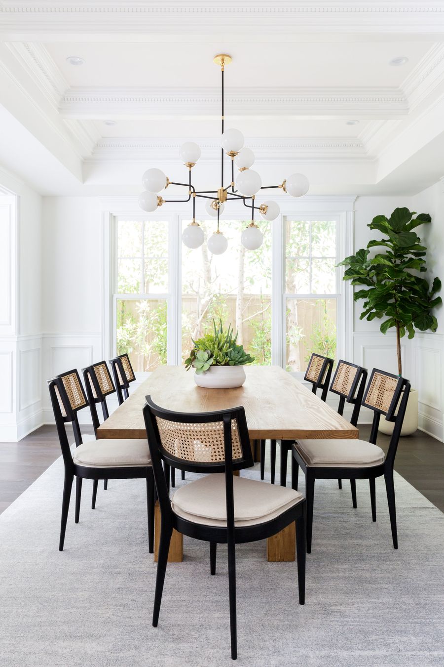 California dining room chairs with cane back via Lindsey Brooke Design