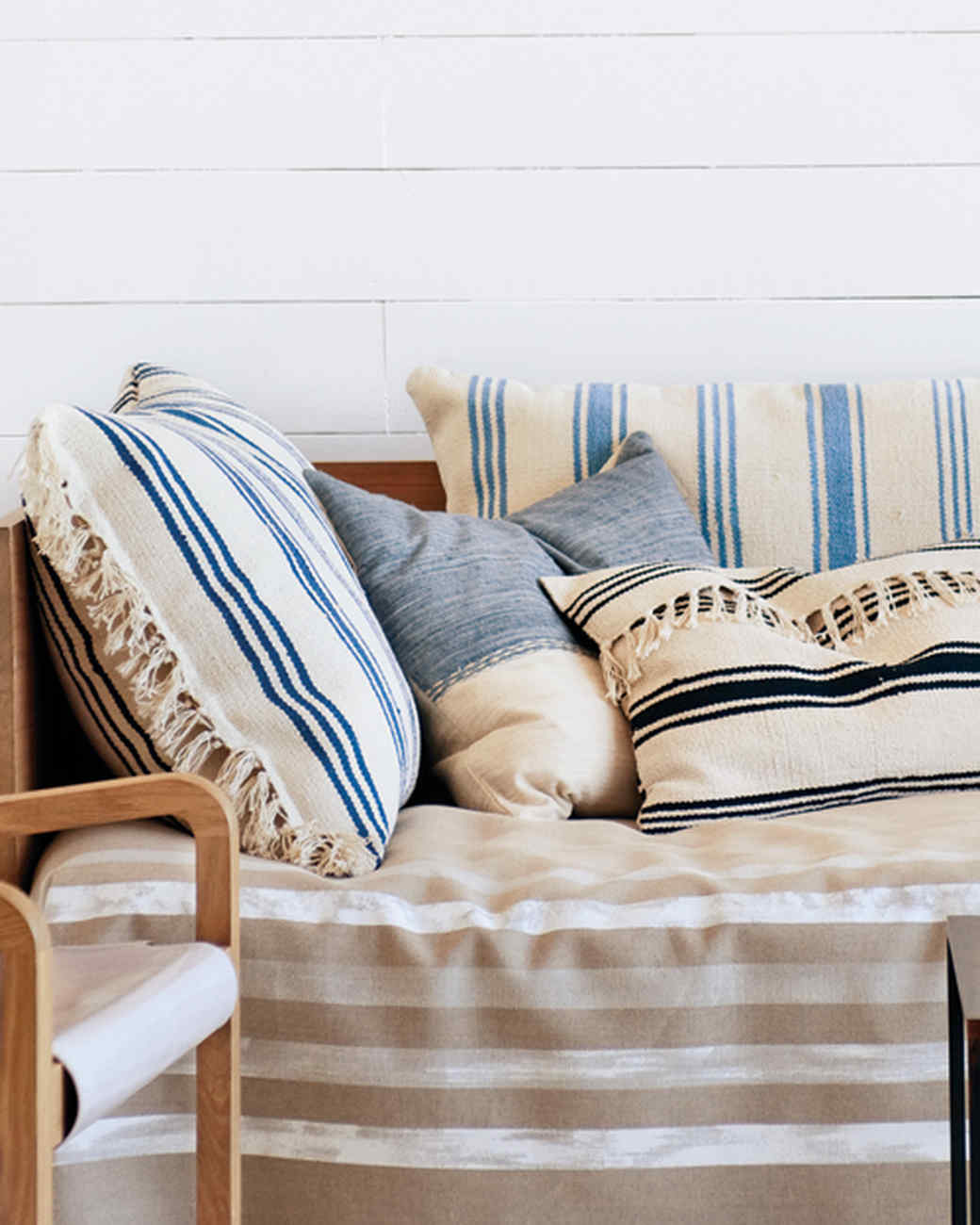 https://curatedinterior.com/wp-content/uploads/2019/01/Choose-the-Right-Throw-Pillows-Blue-striped-throw-pillows.jpg