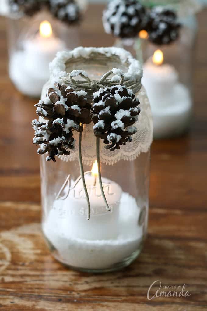 DIY Snowy Pinecone Candle Jars Winter Decor via craftsbyamanda