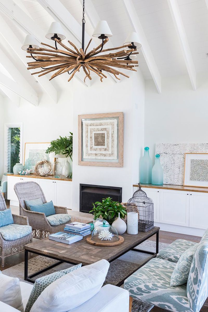 Driftwood Chandelier in Coastal Living Room via Coastal Style