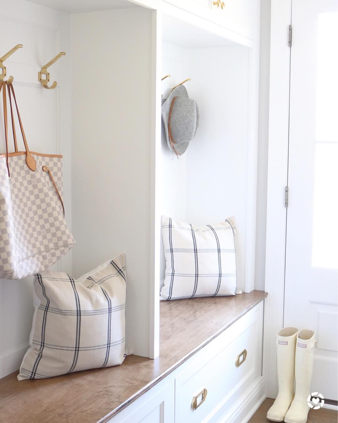 Entryway with built in seating drawers