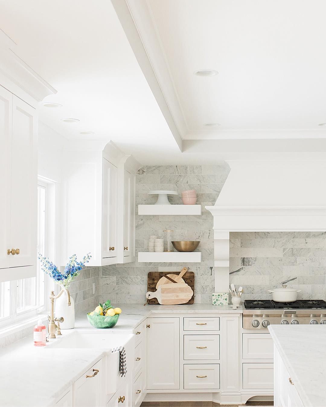 Farmhouse kitchen with brass hardware