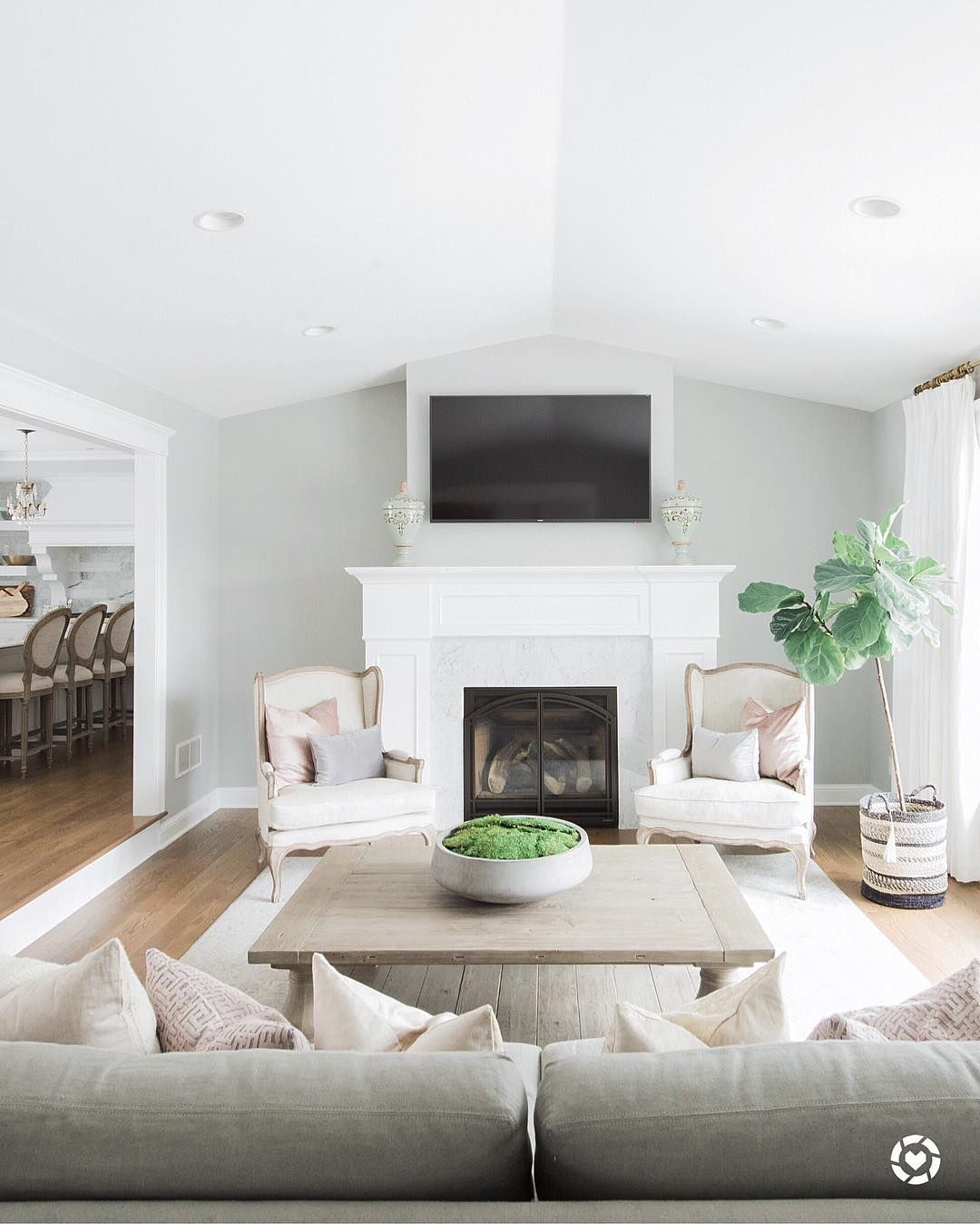 Farmhouse living room with 2 bergere chairs