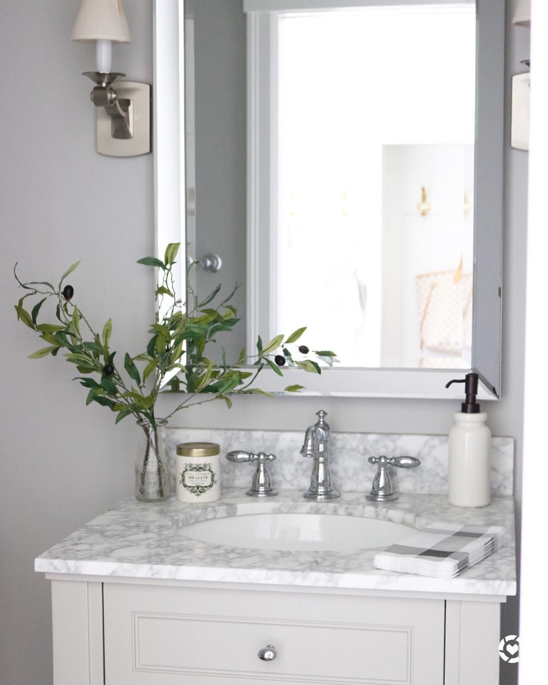 Marble bathroom vanity top with silver faucet