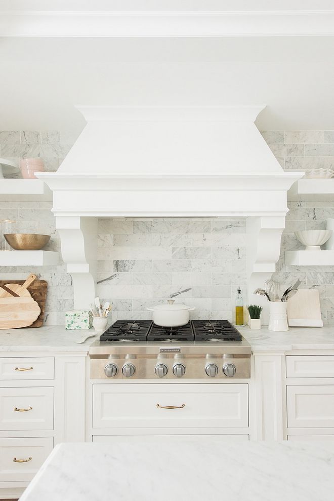 Stainless steel stovetop without oven, marble subway tile backsplash