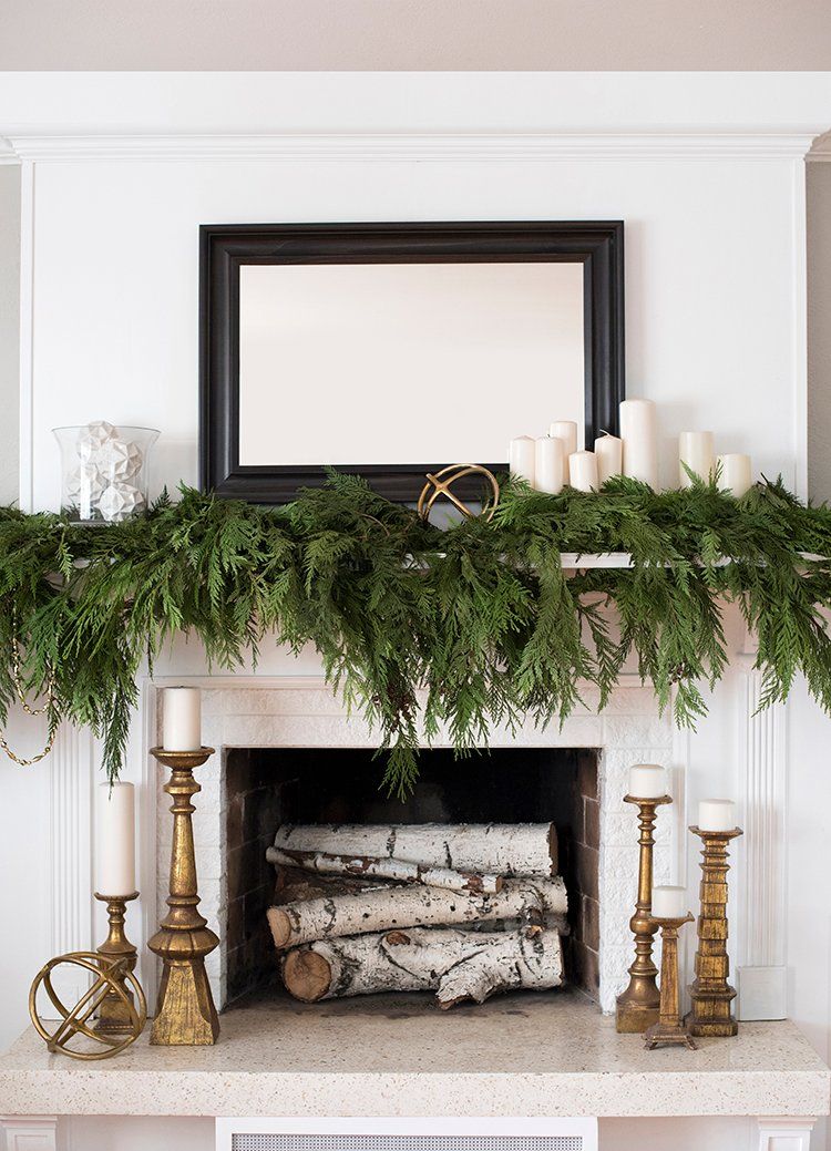 Winter evergreen mantel decor via roomfortuesday