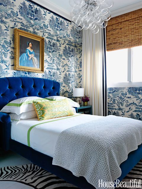 Navy Blue tufted headboard via housebeautiful