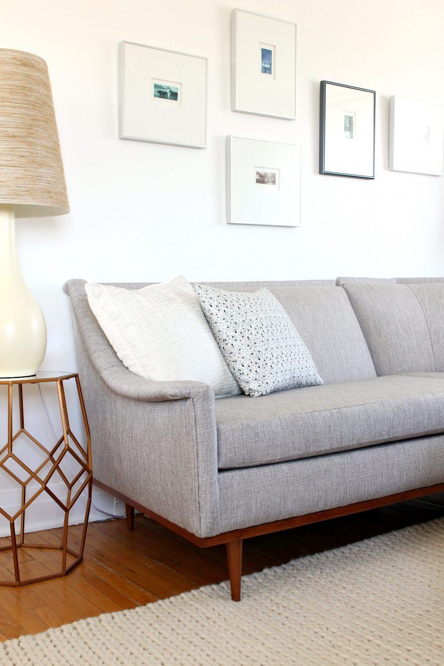 Gray mid-century modern sofa in living room