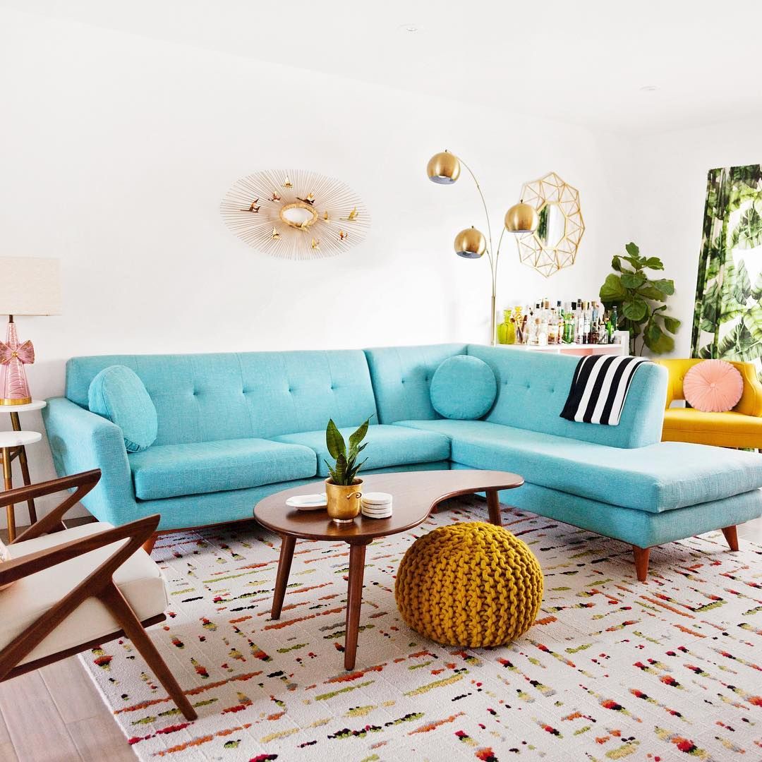 Mid-century modern teal sofa via @melodrama