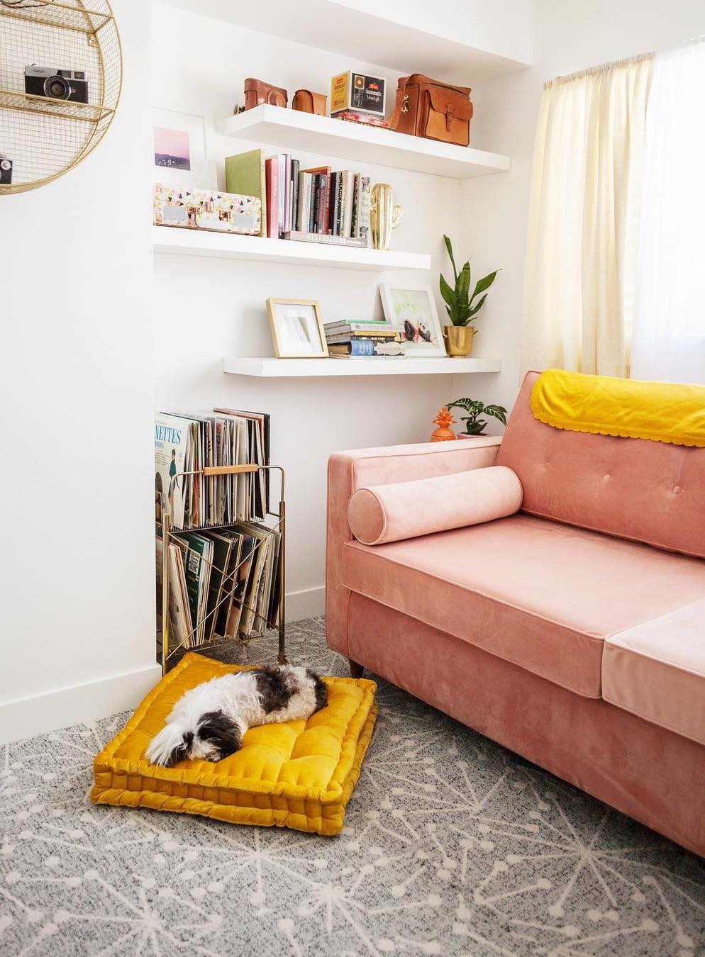 Pink mid-century modern sofa via @melodrama