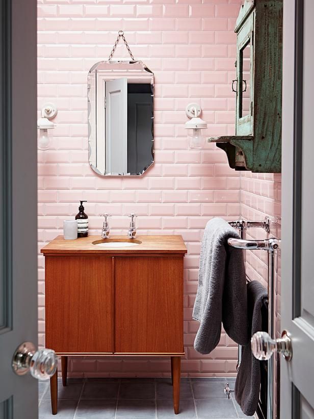 Pink tile mid-century modern bathroom via Home Adore, design by Godrich Interiors