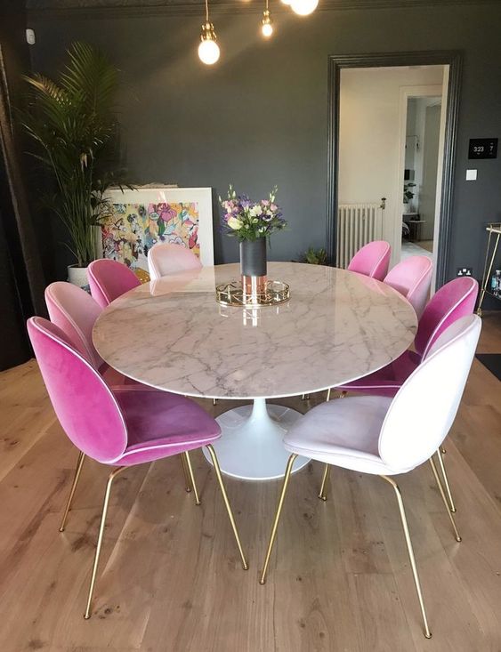 Pink Velvet dining chairs with white marble table