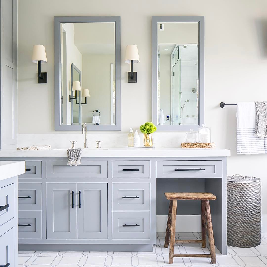 Bathroom with gray blue cabinets via @brookewagnerdesign