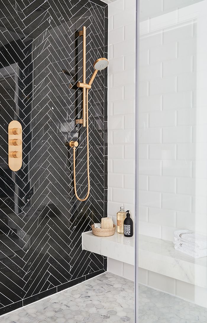 Bathroom with Black Herringbone Shower Tiles and Gold Vintage Faucet - Ali Budd Interiors