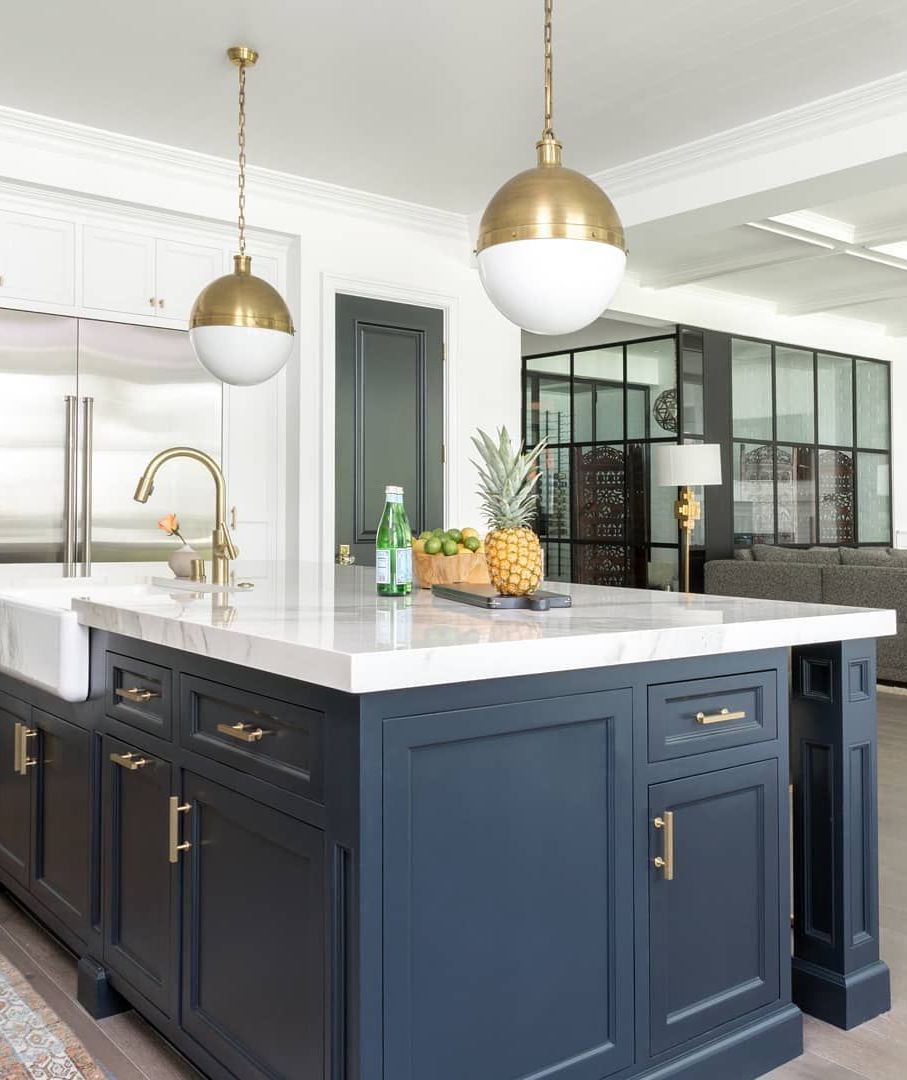 Brass Pendant Lights In Kitchen With Blue Cabinets Via @laurauinteriordesign 