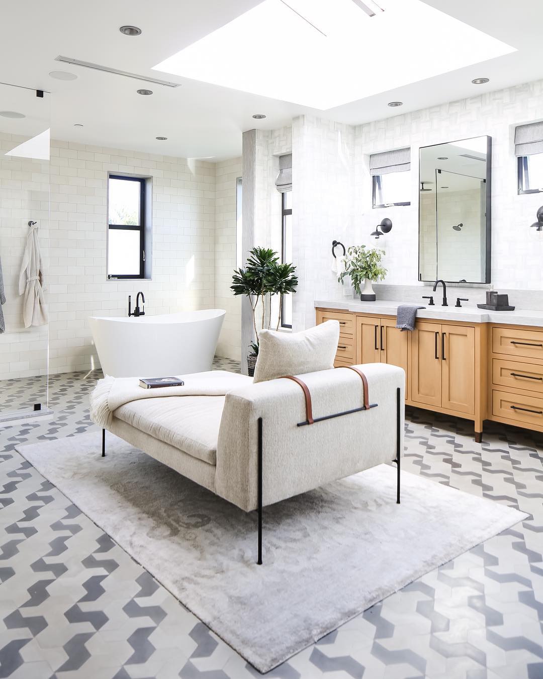 Chaise Lounge in the bathroom @brookewagnerdesign