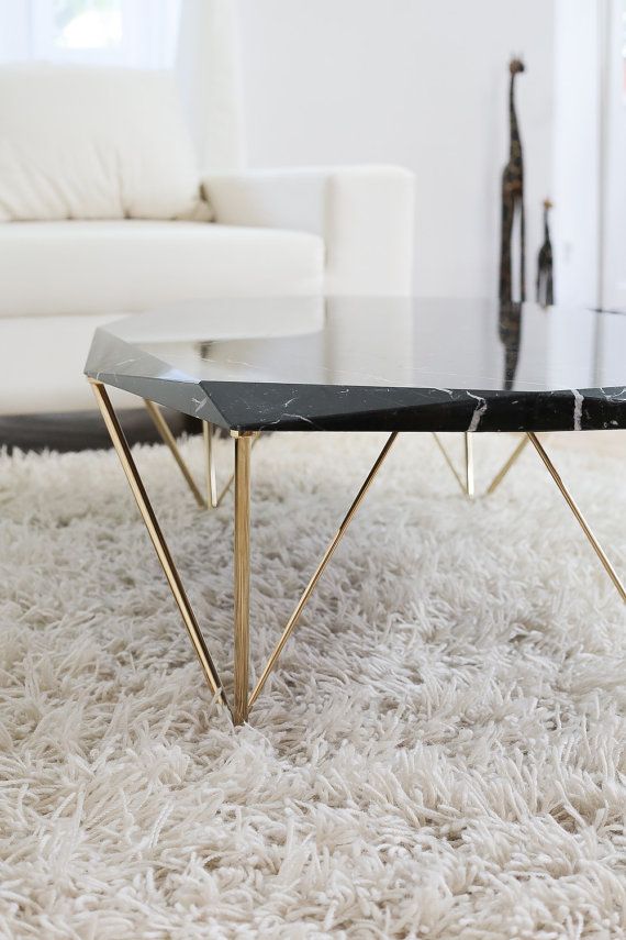 Black marble coffee table with gold legs