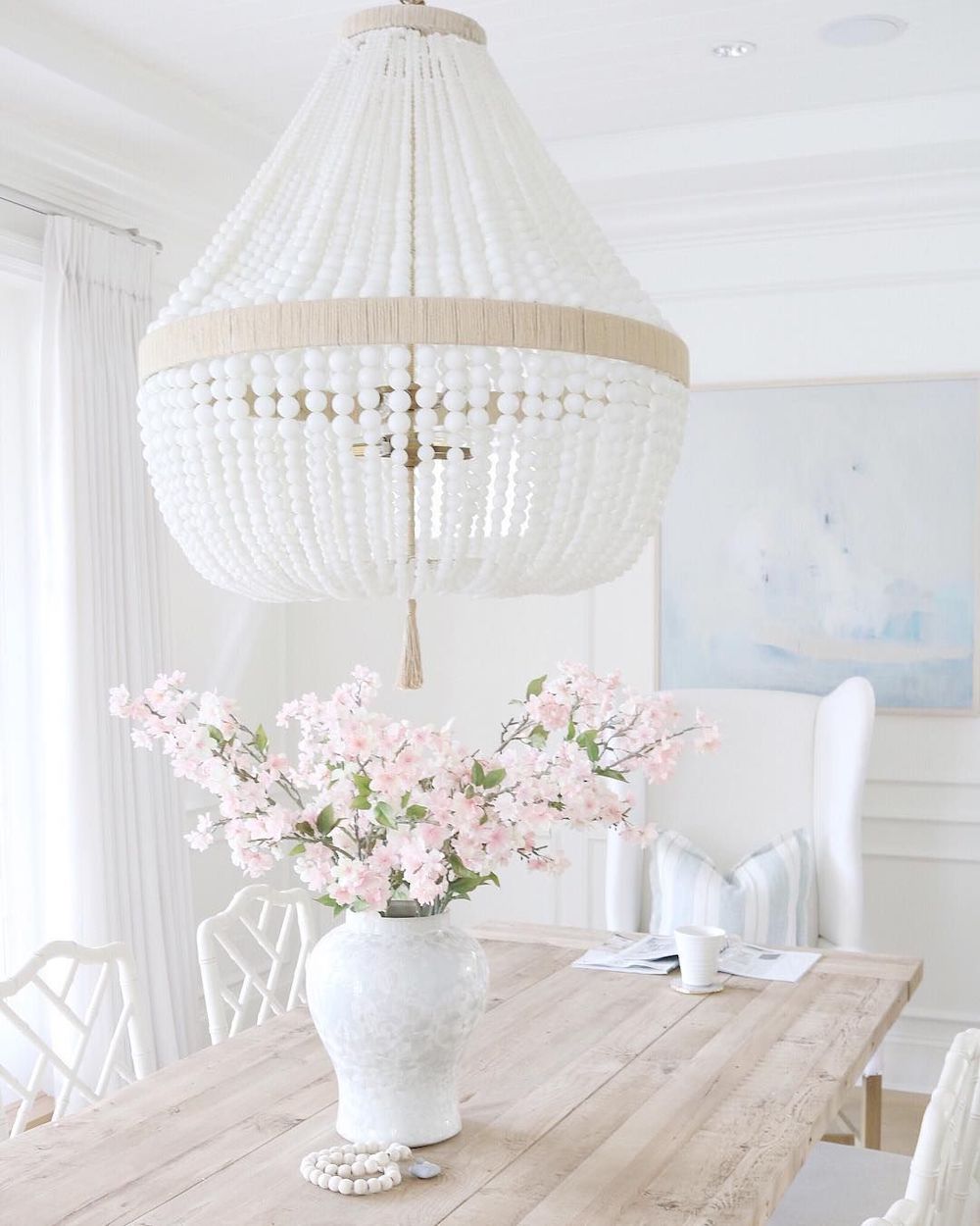 15 Best Coastal Chandeliers For Beach Homes   White Beaded Coastal Style Chandelier Via @jseveryday 