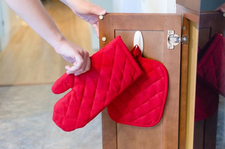 Adhesive Hooks to Hang Oven Mitts and Hot Pads via The Krazy Coupon Lady