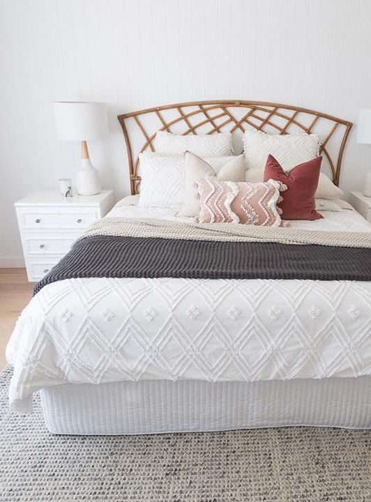 Bohemian bedroom with rattan headboard via @hatchinteriors