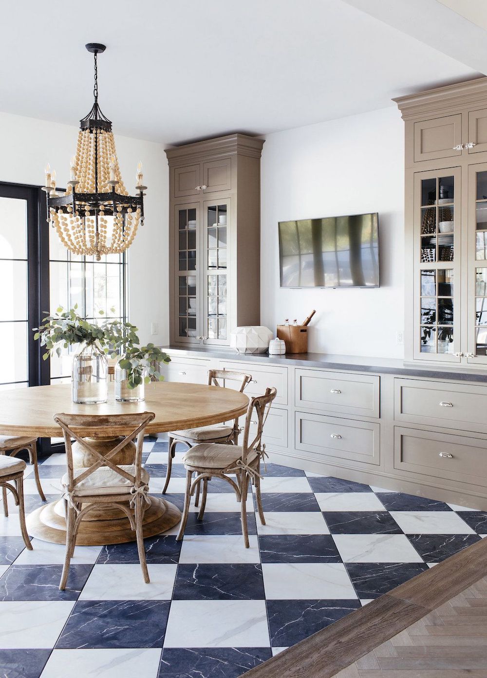 French Country Dining Room with Black and White Checkered Floor Tiles via thelifestyledco