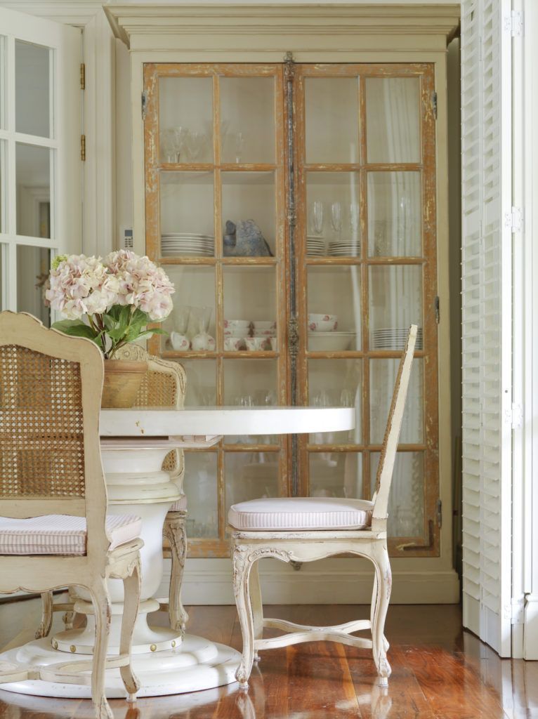 Glass Pane Hutch in French Country Dining Room via Minnie Peters