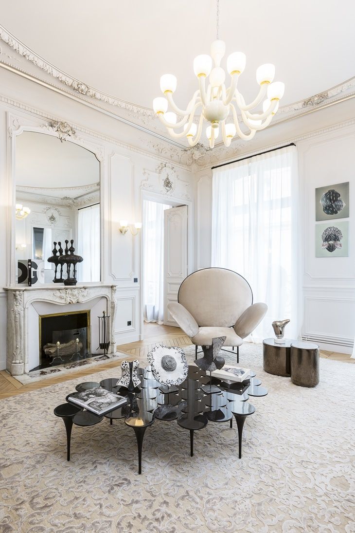 Parisian rugs in living room designed by Gerard Faivre
