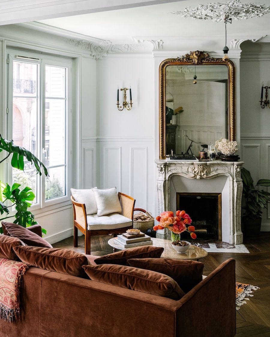 Parisian living room with Burgundy velvet sofa AptLafayetteParis