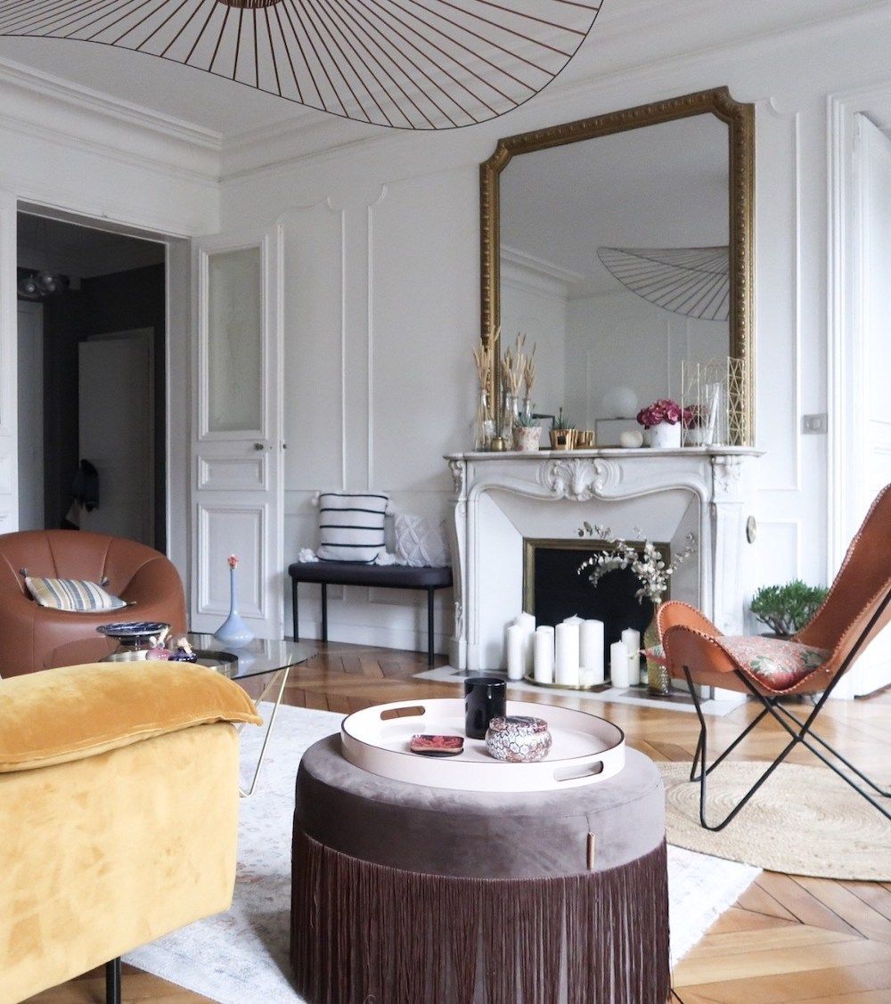 Parisian living room with leather butterfly chair via hello-hello Darya Kopp