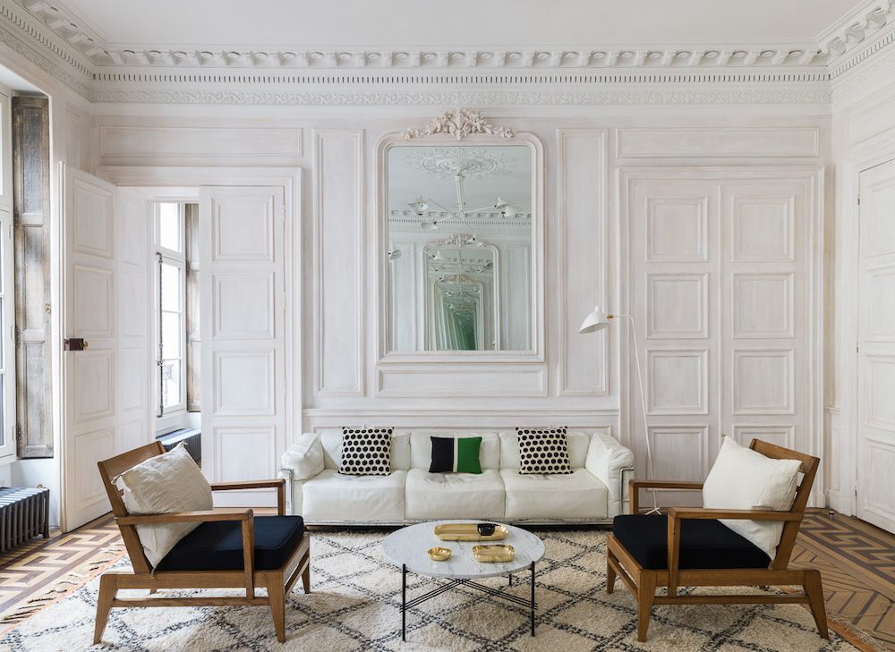 Parisian living room with marble coffee table