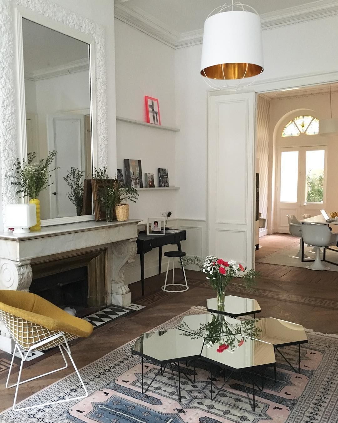 Parisian living room with mirror coffee table via @annelauremais