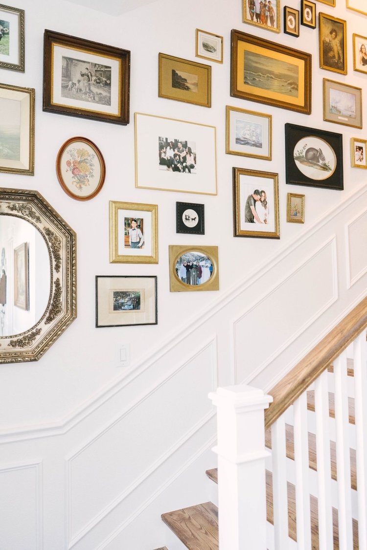 Vintage Staircase gallery wall via Farmhouse Living