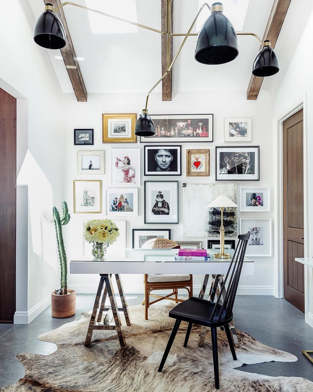 Gallery wall behind desk via @marieflaniganinteriors