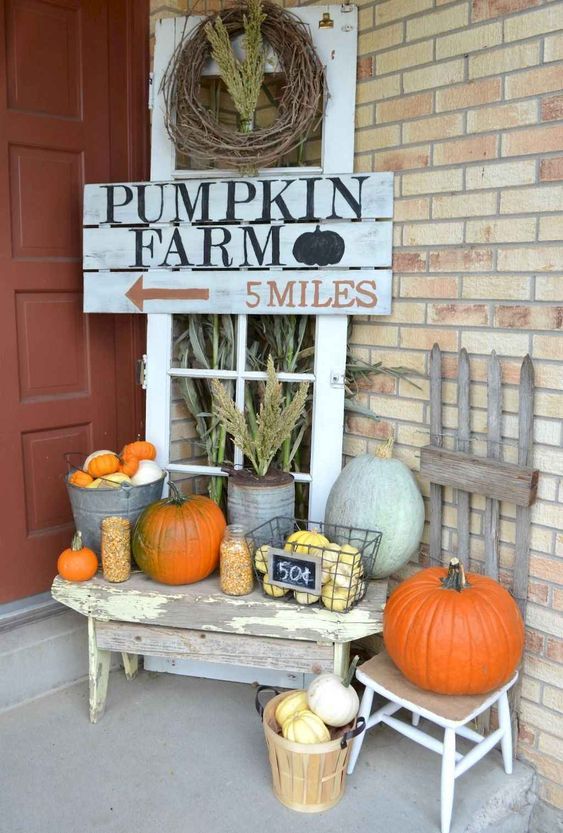 Fall front porch with Pumpkin Farm Sign