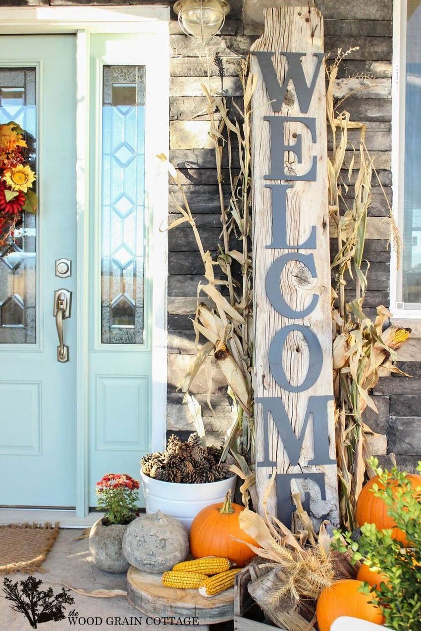 Fall front porch with vertical Welcome Sign via thewoodgraincottage