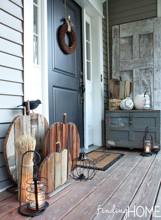 Farmhouse Fall Front Porch with Reclaimed Wood Pumpkins via findinghomefarms