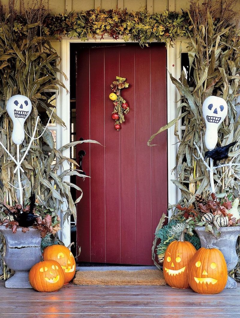 Ghosts in the cornstalks on Halloween front porch decor via GlassShopLocal