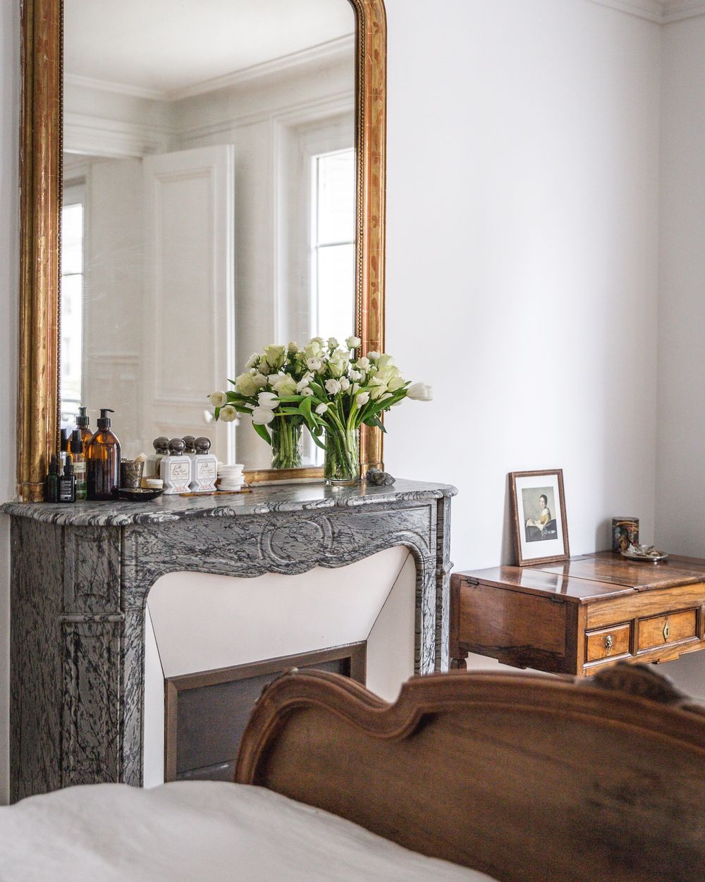 Gray marble Parisian Fireplace in Bedroom via AptLafayetteParis