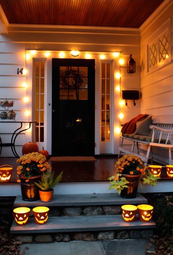 Halloween string lights around front door on the porch