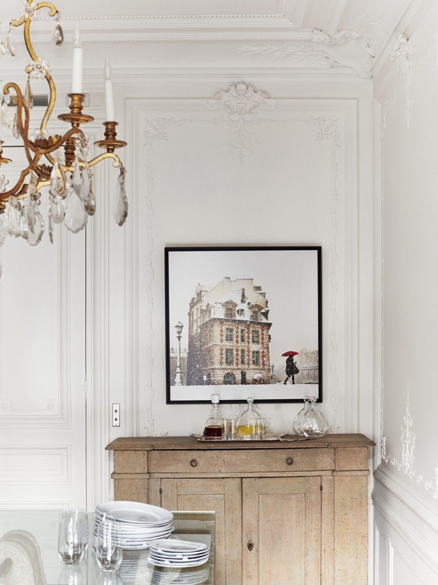 Parisian dining room design with Wood cabinet via A+B Kasha