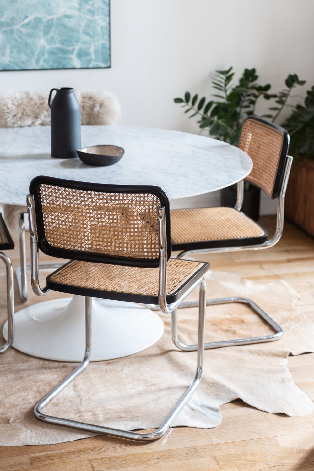 Parisian dining room design with a Marble table and Breuer chairs via Charlotte Cade et Maxime Brousse