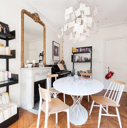 Parisian dining room with Mismatched chairs and paper chandelier via FrenchyFancy-6