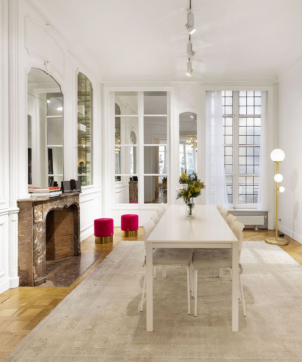 Parisian dining room with Off-white rug and white furniture via Havenin Saint Honore