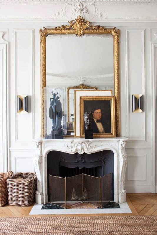 Parisian fireplace decor with Layered artwork