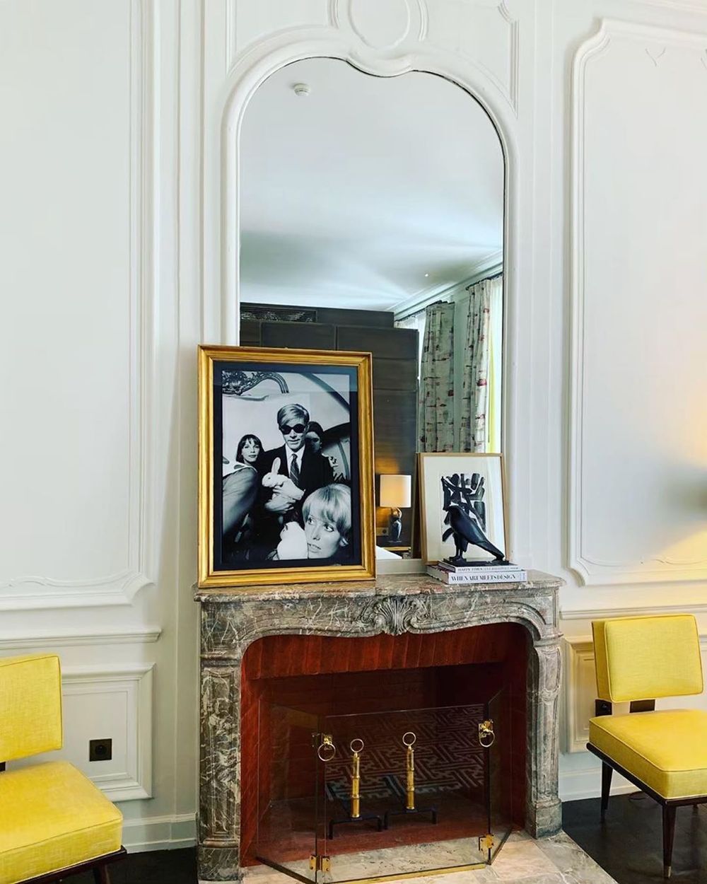 Parisian fireplace with Andy Warhol photography via @jkplaceparis