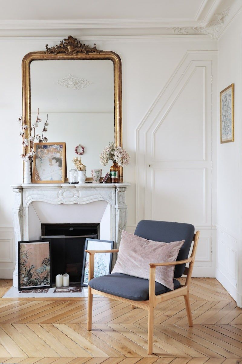 Parisian fireplace with Art, Candles, and Cotton via Hello-hello Sweet Cabane