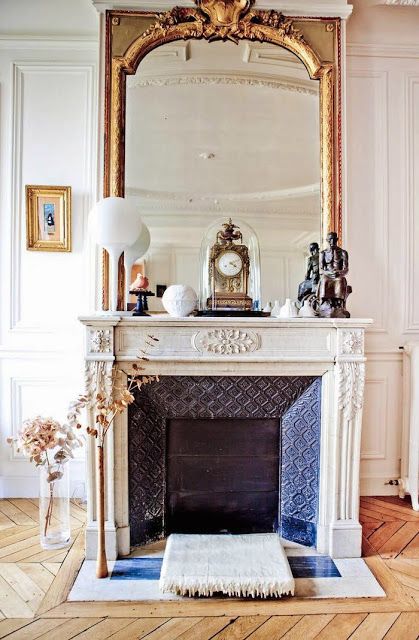 Parisian fireplace with Vintage objects