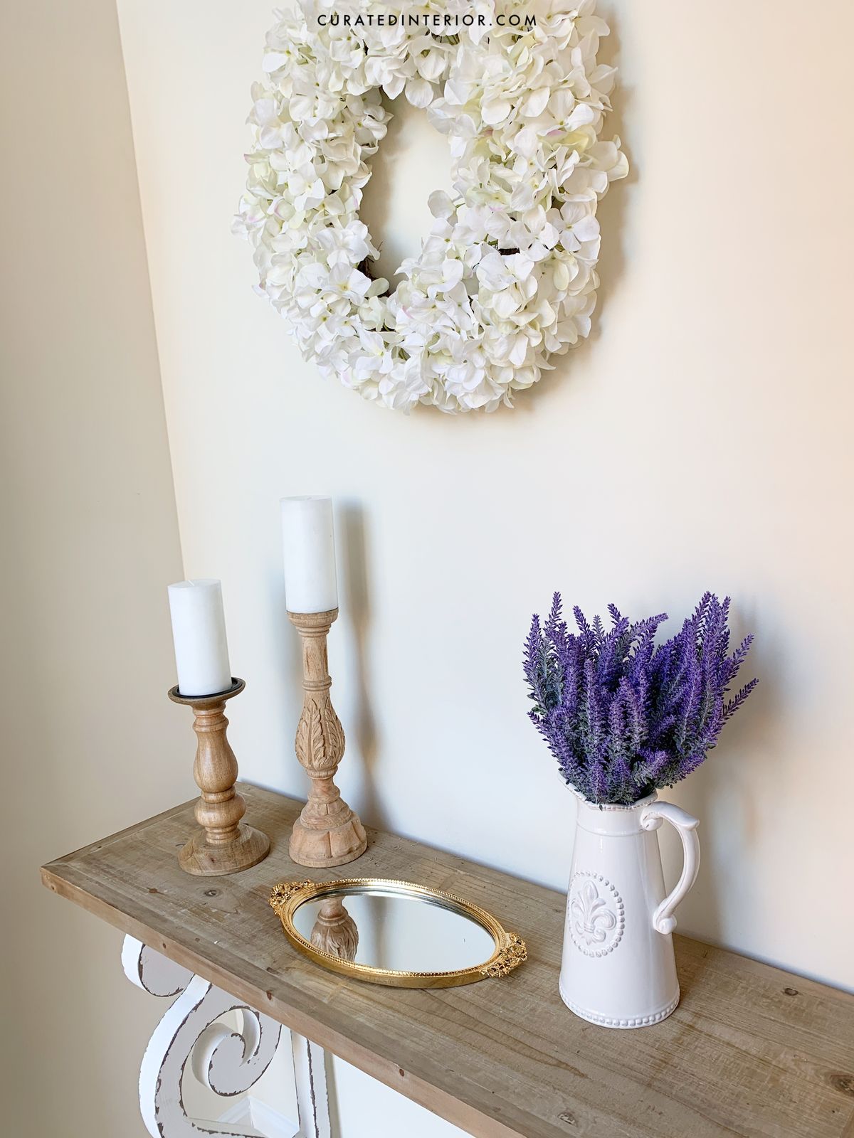 French Country Console Table with Wood Candlesticks, Vintage Mirror Tray and White Pitcher with Lavender
