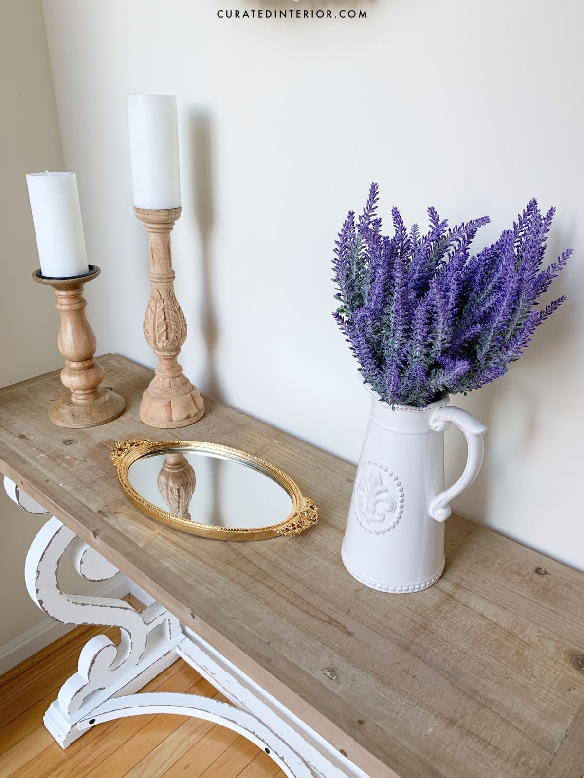 French Country Console Table with Wood Candlesticks, Vintage Mirror Tray and White Pitcher with Lavender