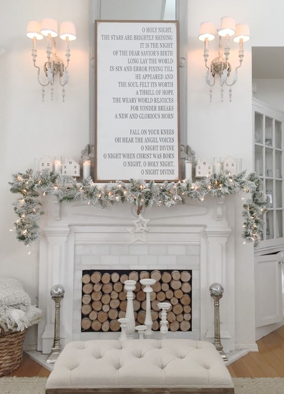 Neutral white Christmas Mantel Decor via Sara Hanson